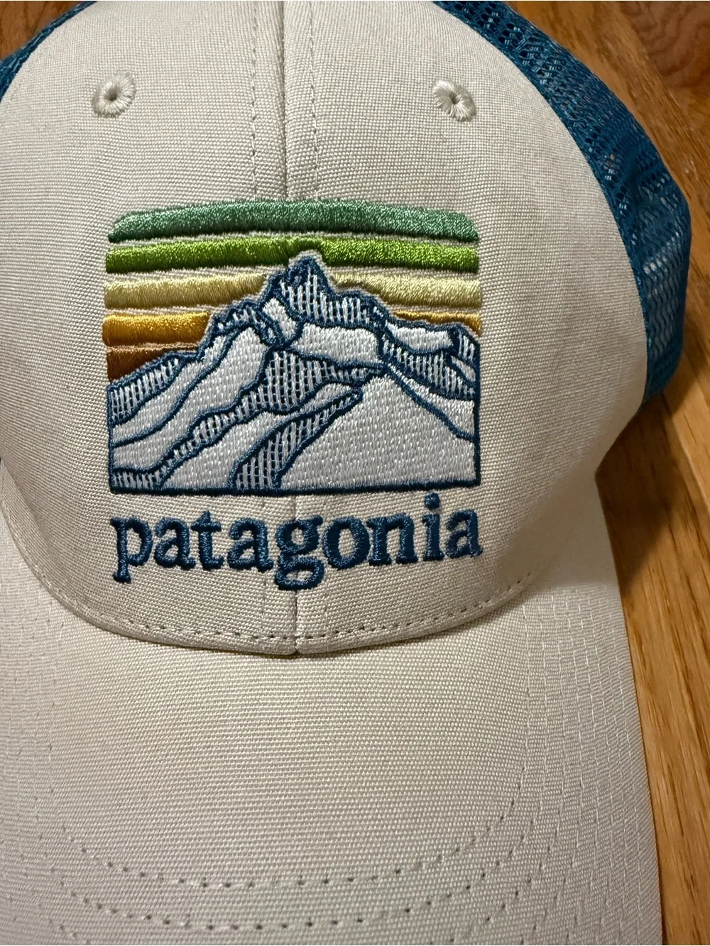 Patagonia Cream and Blue Trucker Hat with Multi-Stripe Mountain Logo